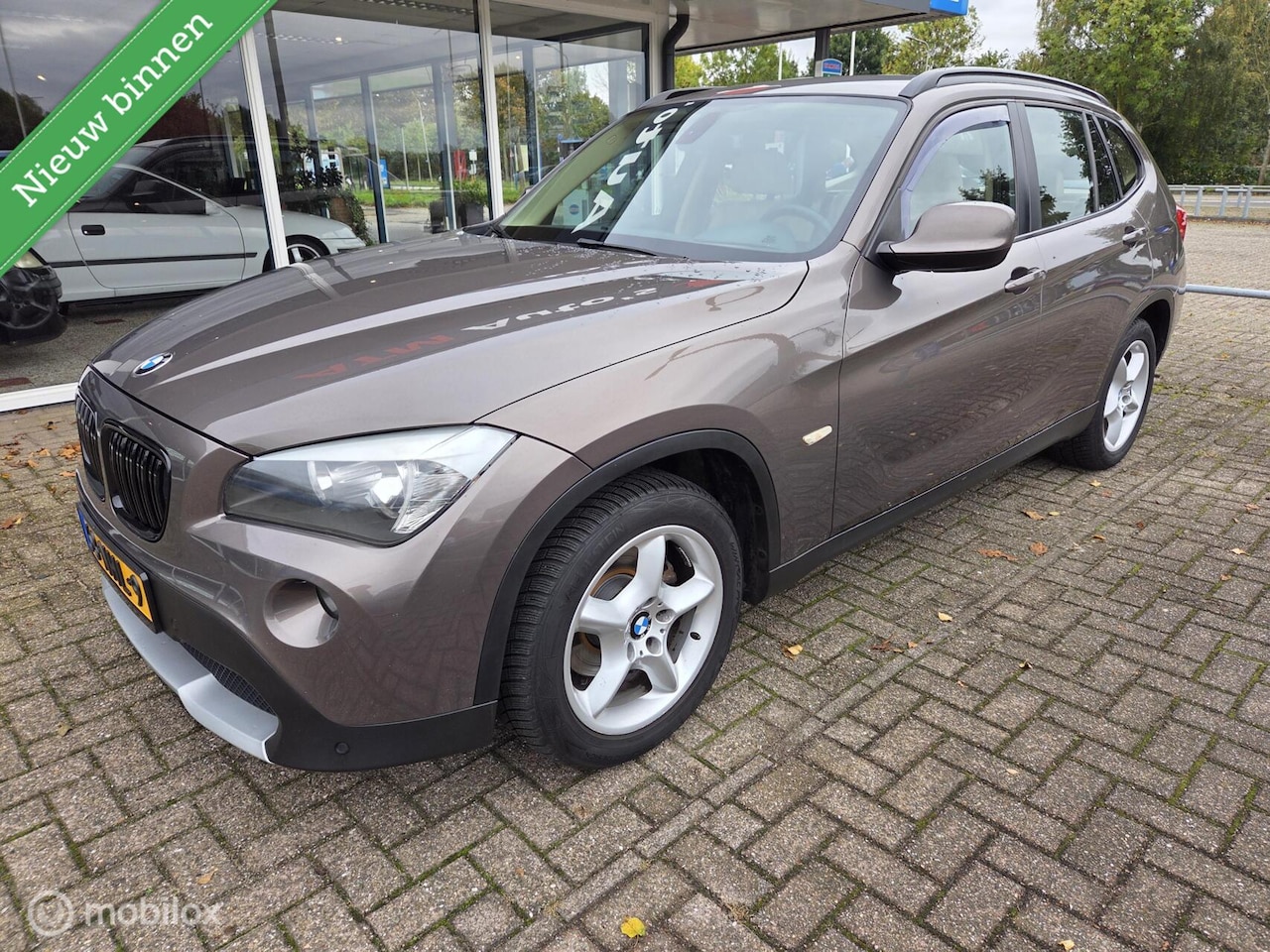 BMW X1 - sDrive18i Executive Airco Apk Cruise PDC LMV Export - AutoWereld.nl