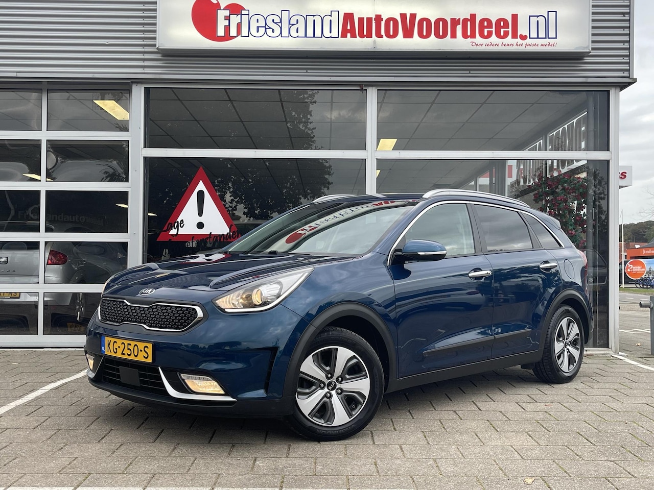 Kia Niro - 1.6 GDi Hybrid Business line /adapt. cruise/Leder/Trekhaak/stuur- en stoel verw./Keyless/ - AutoWereld.nl