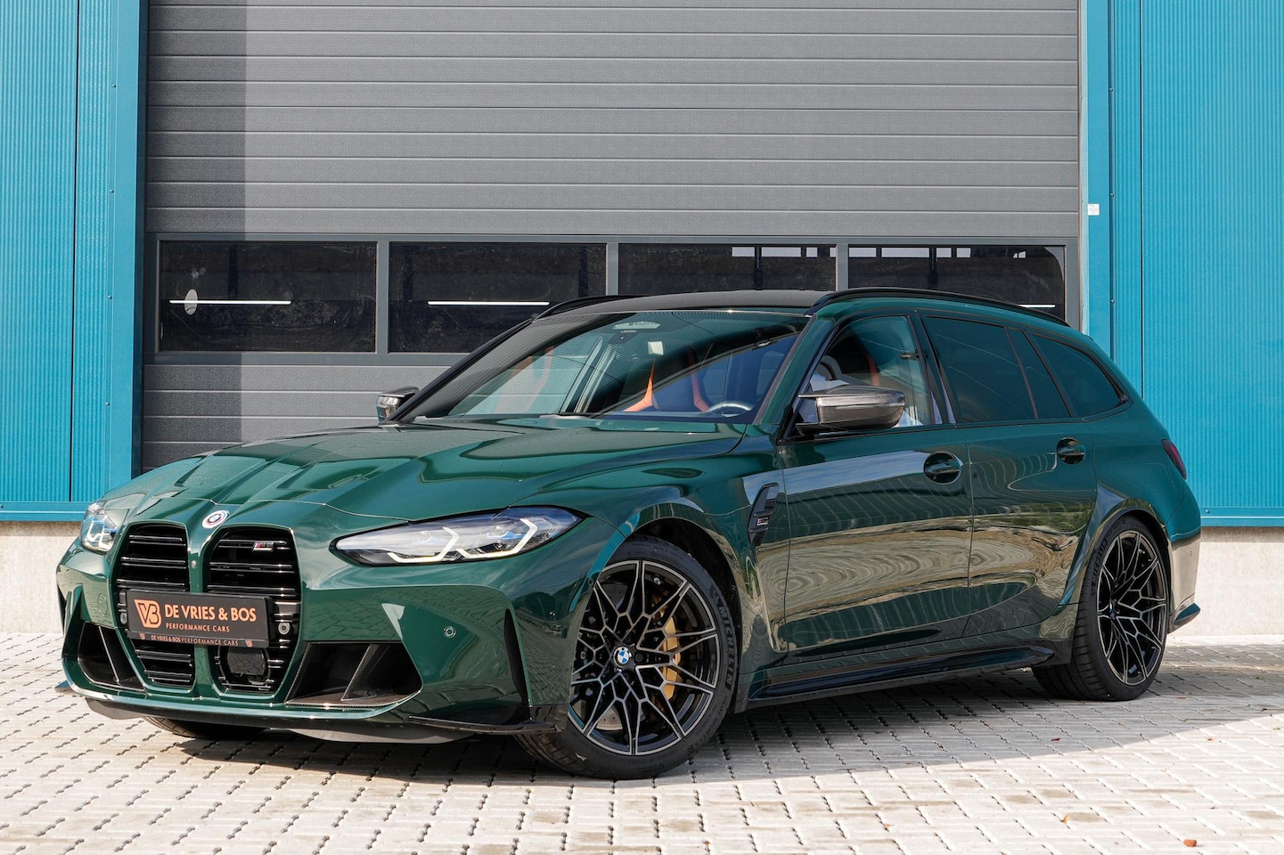 BMW 3-serie Touring - M3 Competition British Racing Green | Trackpack | PPF | Keramisch - AutoWereld.nl