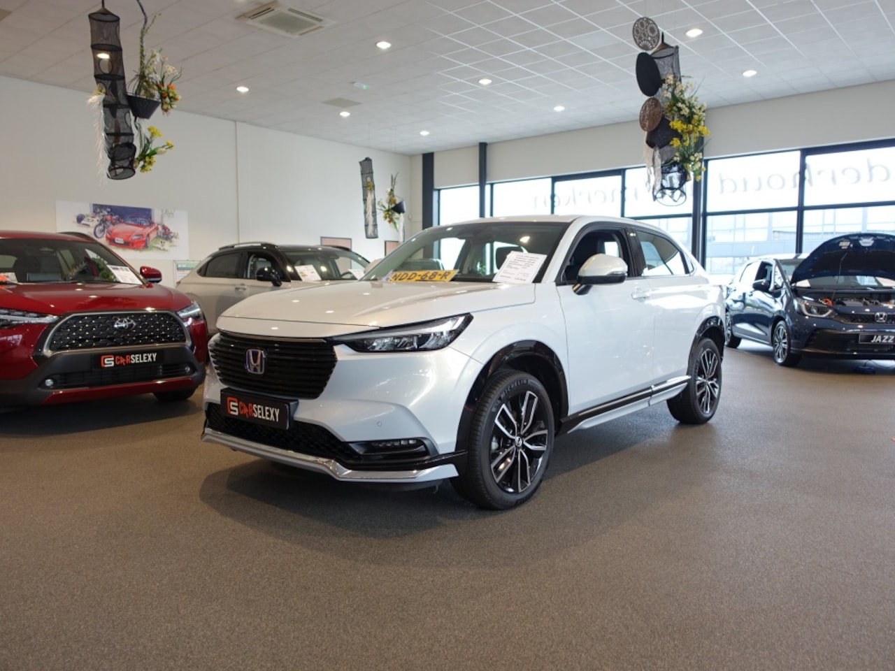 Honda HR-V - 1.5 i-MMD 131pk CVT Advance Zwarte Grille en Sportpakket - AutoWereld.nl
