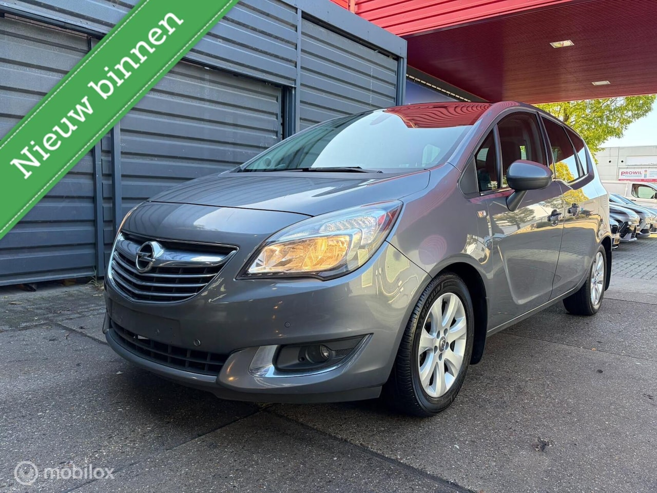 Opel Meriva - 1.4 Turbo Cosmo Pano PDC Trekhaak Navi - AutoWereld.nl