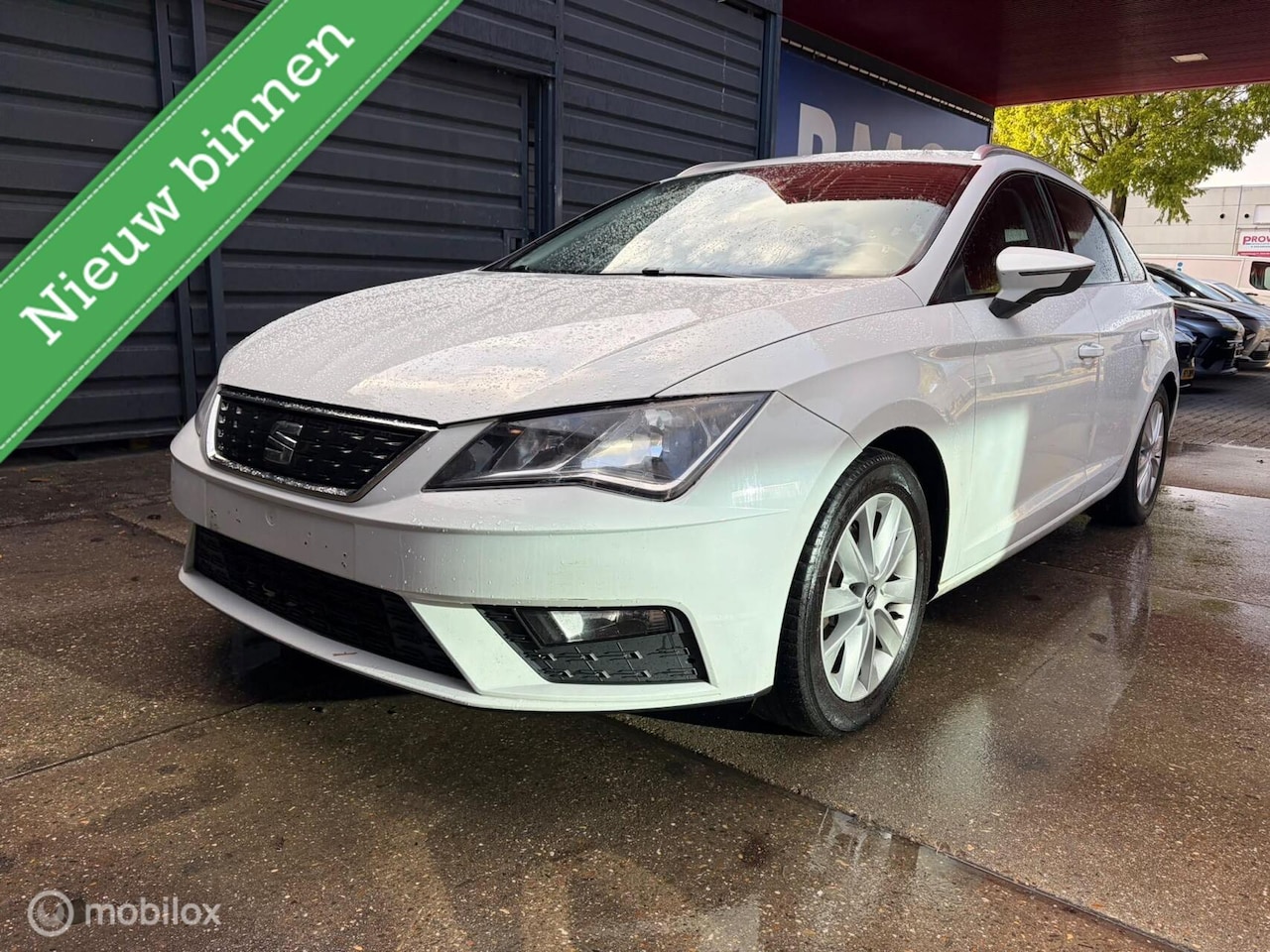SEAT Leon ST - 1.0 EcoTSI Trekhaak Cruise Navi Carplay Clima - AutoWereld.nl