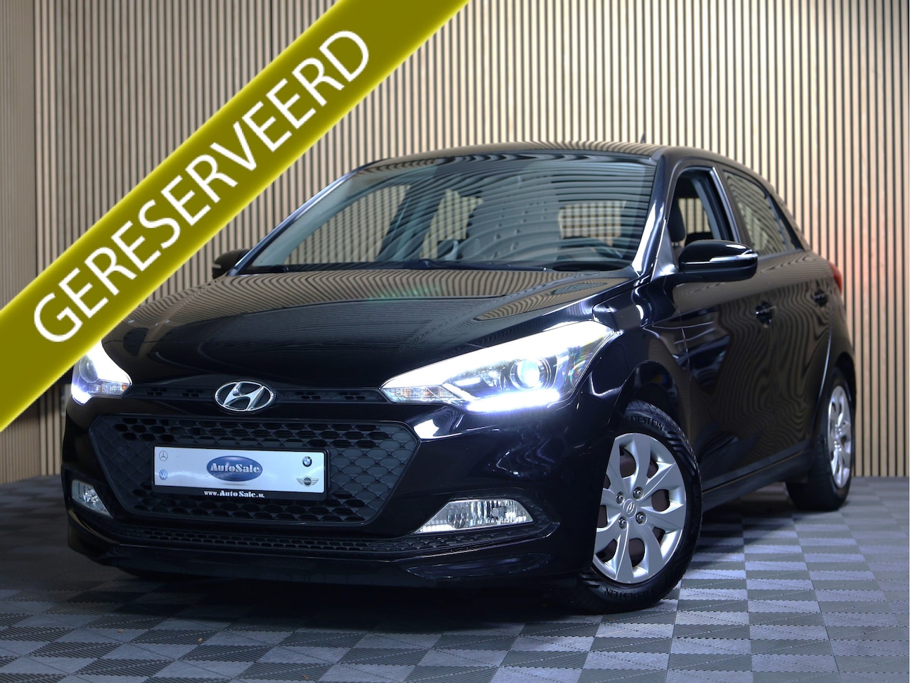 Hyundai i20 - 1.2 HP i-Motion Comfort CRUISE CLIMA BT THAAK NAP '15 - AutoWereld.nl