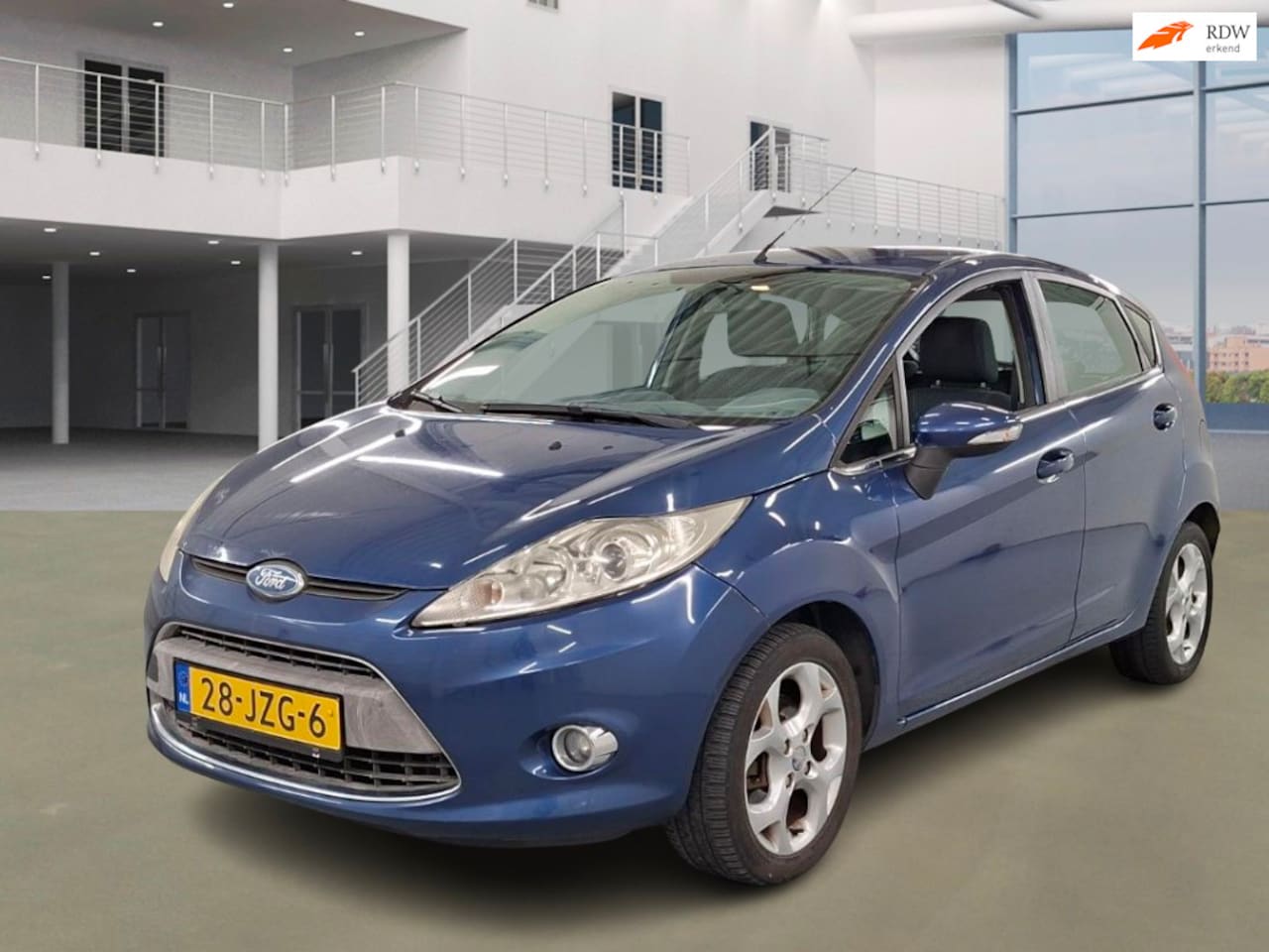 Ford Fiesta - 1.25 Titanium AIRCO 2 X SLEUTELS BOEKJES - AutoWereld.nl
