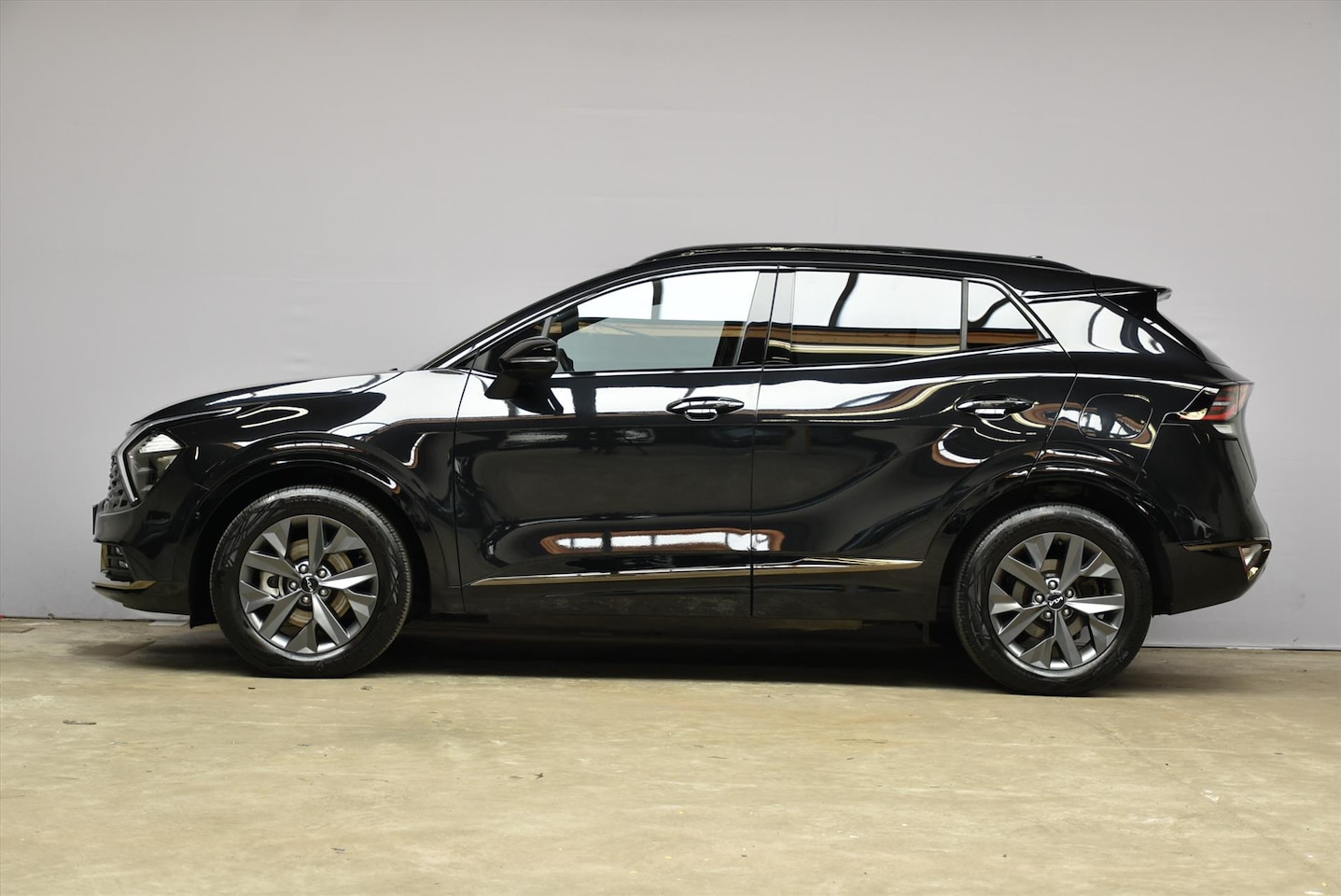 Kia Sportage - 1.6 T-GDi 230pk Hybrid AT6 Dark Edition - AutoWereld.nl