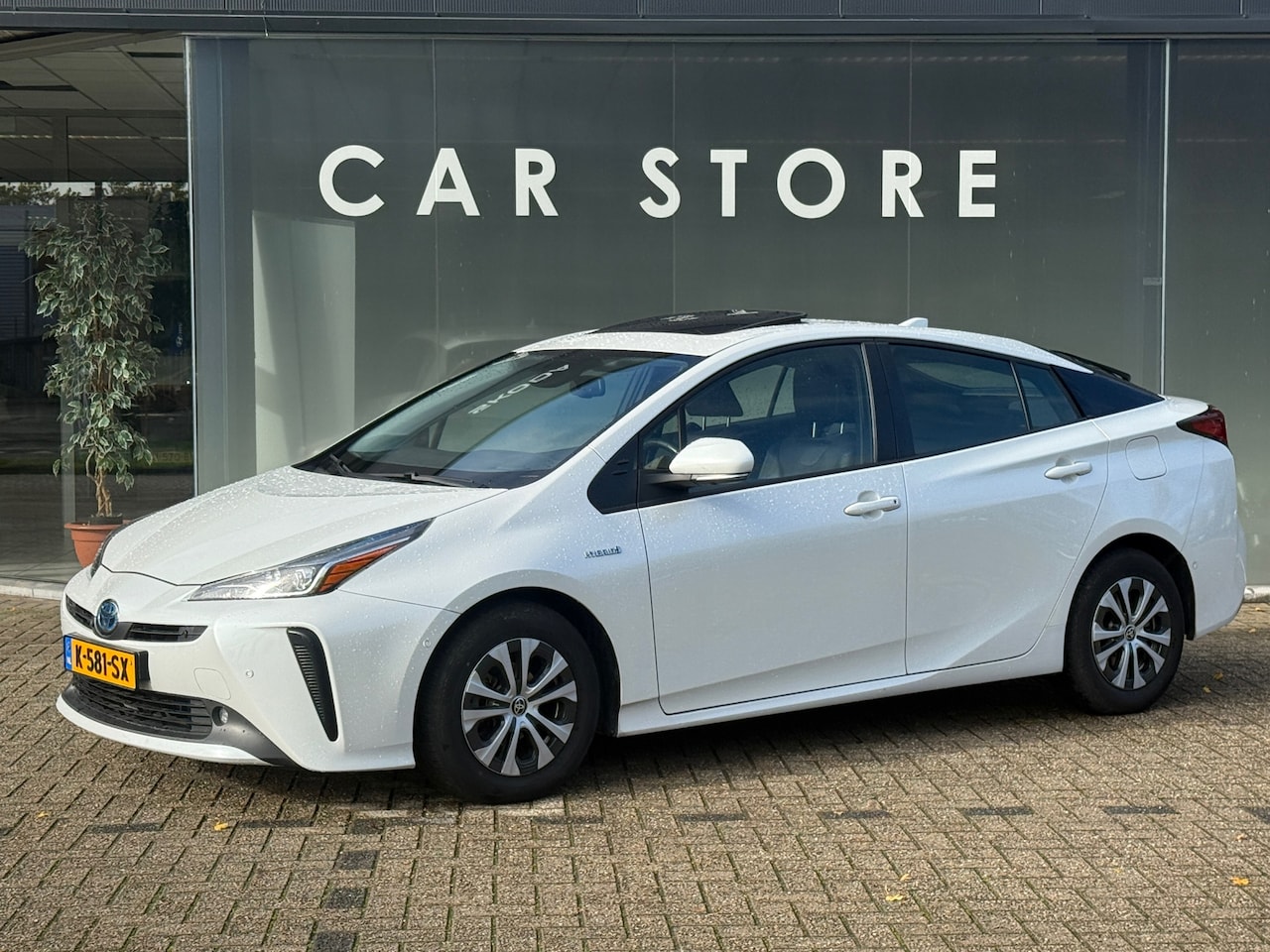Toyota Prius - 1.8 Executive Hybride Schuifdak|Leder|360cam - AutoWereld.nl
