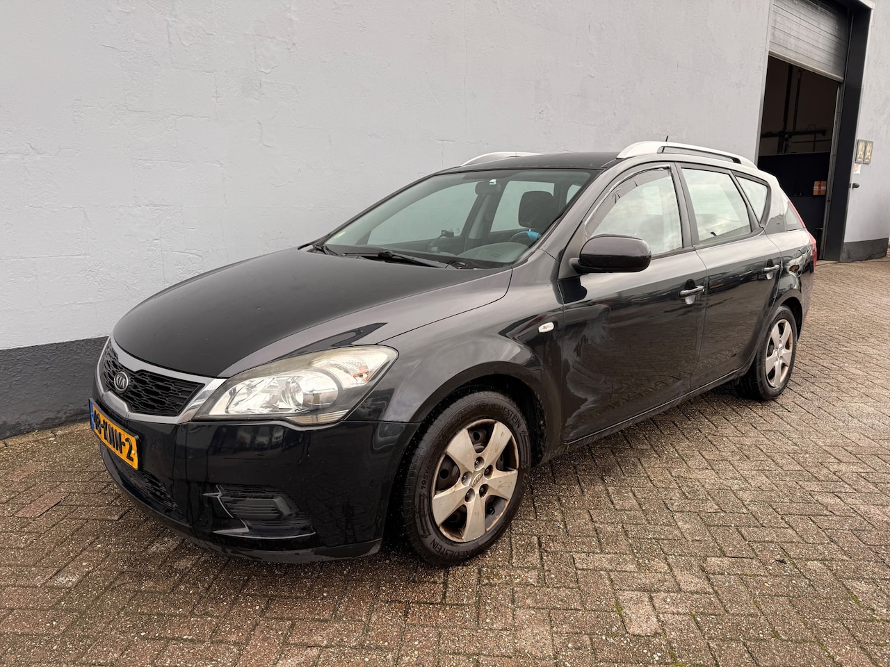 Kia Cee'd Sporty Wagon - 1.4 CVVT X-tra - Trekhaak - AutoWereld.nl