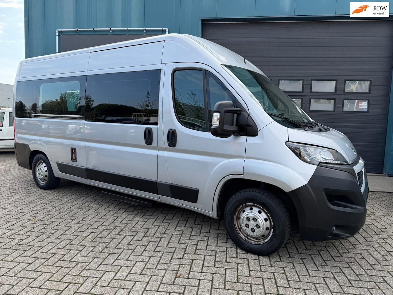Peugeot Boxer - 333 2.0 BlueHDI L2H2 Premium 9-pers Rolstoellift Elec zijdeur Clima Cruise Navi Pdc Apk10- - AutoWereld.nl