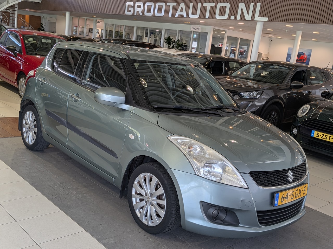 Suzuki Swift - 1.2 Exclusive EASSS Airco, Cruise Control, Stuurbekrachtiging - AutoWereld.nl