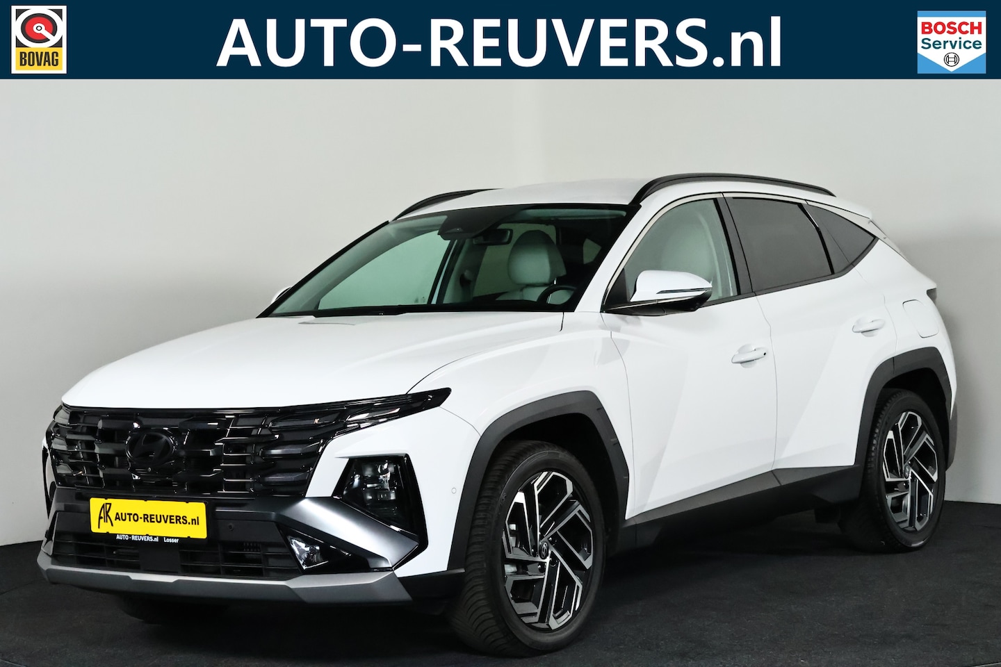Hyundai Tucson - 1.6 T-GDI PHEV Premium 4WD Navi / ACC / HUD / CarPlay / Leder / Memory - AutoWereld.nl