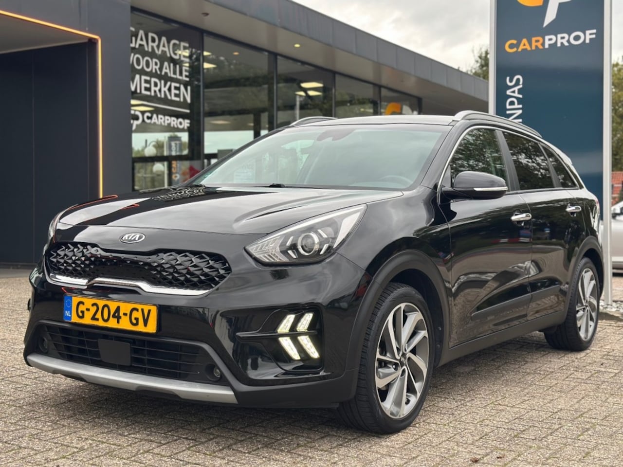 Kia Niro - 1.6 GDI Hybrid DynamicLine Trekhaak - 18 LM - Allseasonbanden - AutoWereld.nl