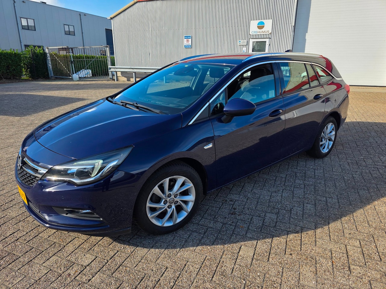 Opel Astra Sports Tourer - 1.0 Business Executive 1.0 Business Executive - AutoWereld.nl
