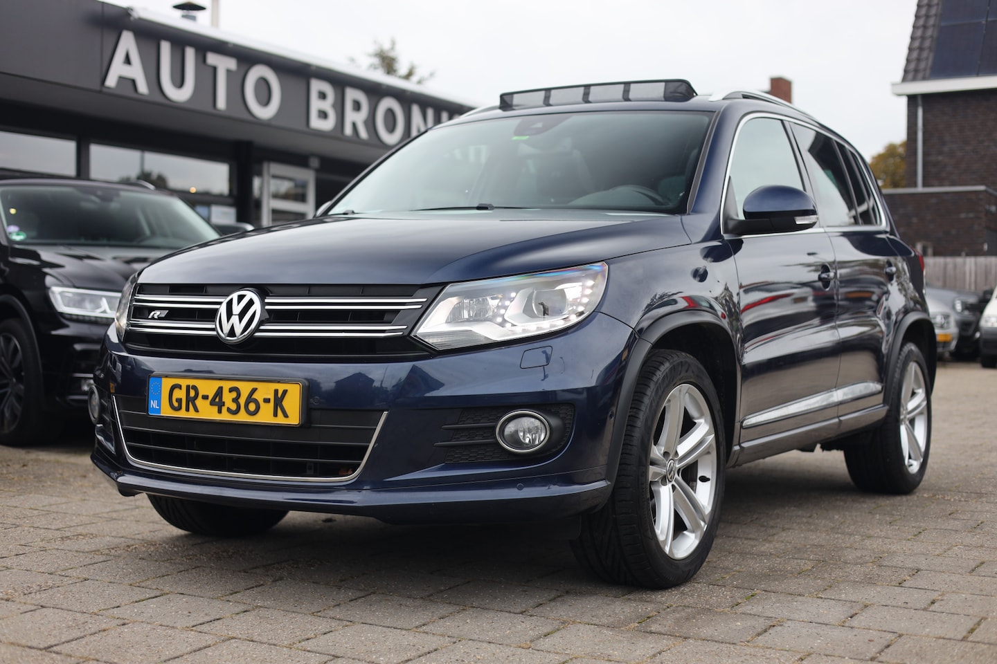 Volkswagen Tiguan - 1.4 TSI R-LINE | AUT | PANO | NAVI | DYNAUDIO | TREKHAAK - AutoWereld.nl