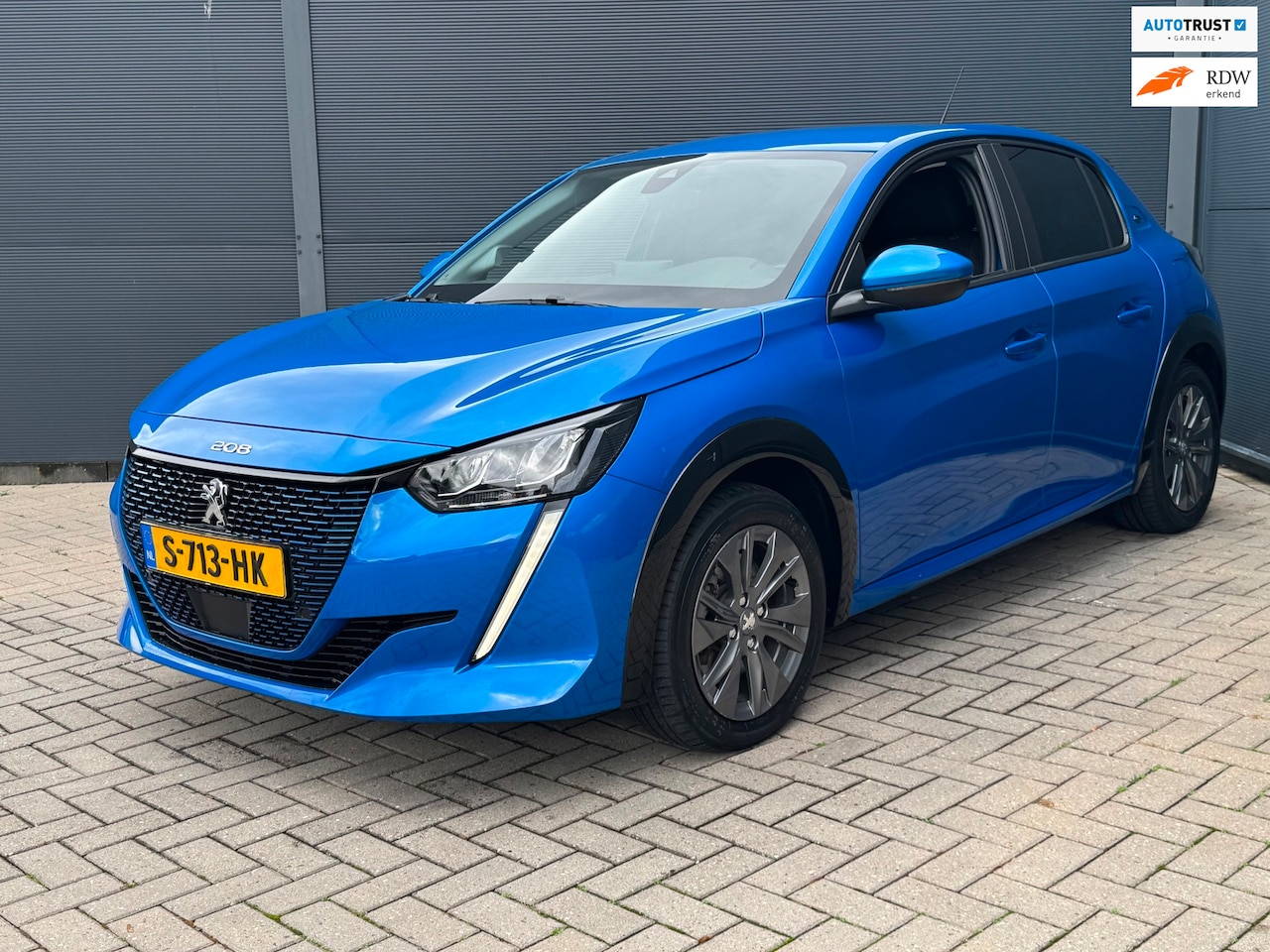 Peugeot e-208 - EV Blue Lease Allure 50 kWh / Carplay - AutoWereld.nl
