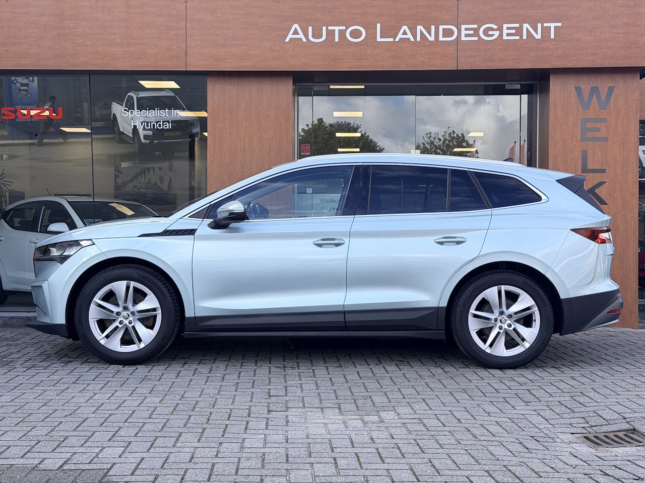 Skoda Enyaq iV - 80 | Camera | Carplay | DAB | NAV | Cruise control | Open dak | Stoel verwarming - AutoWereld.nl