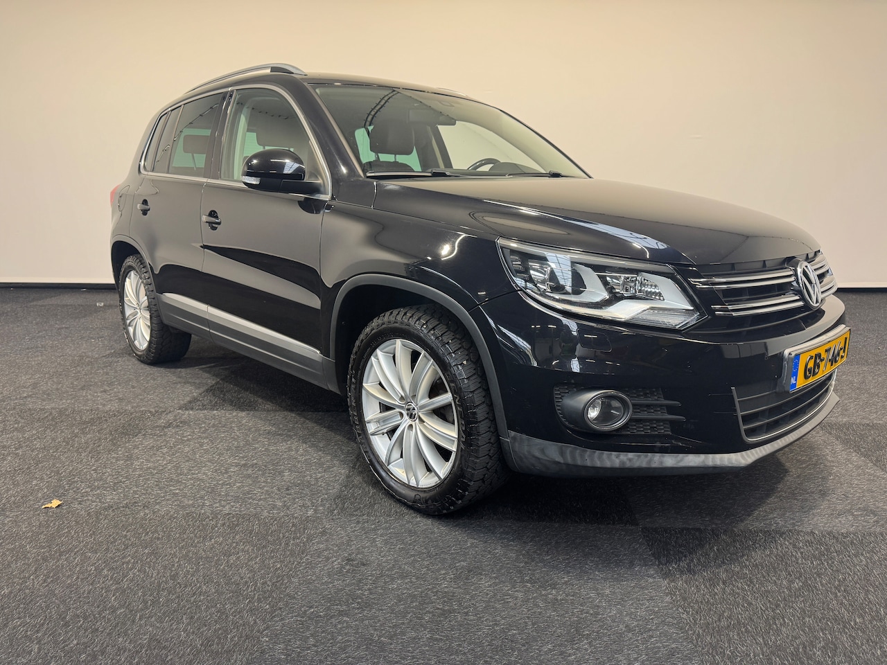 Volkswagen Tiguan - Tiguan 2.0 TSI 180pk 4Motion Sport en Style 5 d 2011 8 2015 6 - AutoWereld.nl