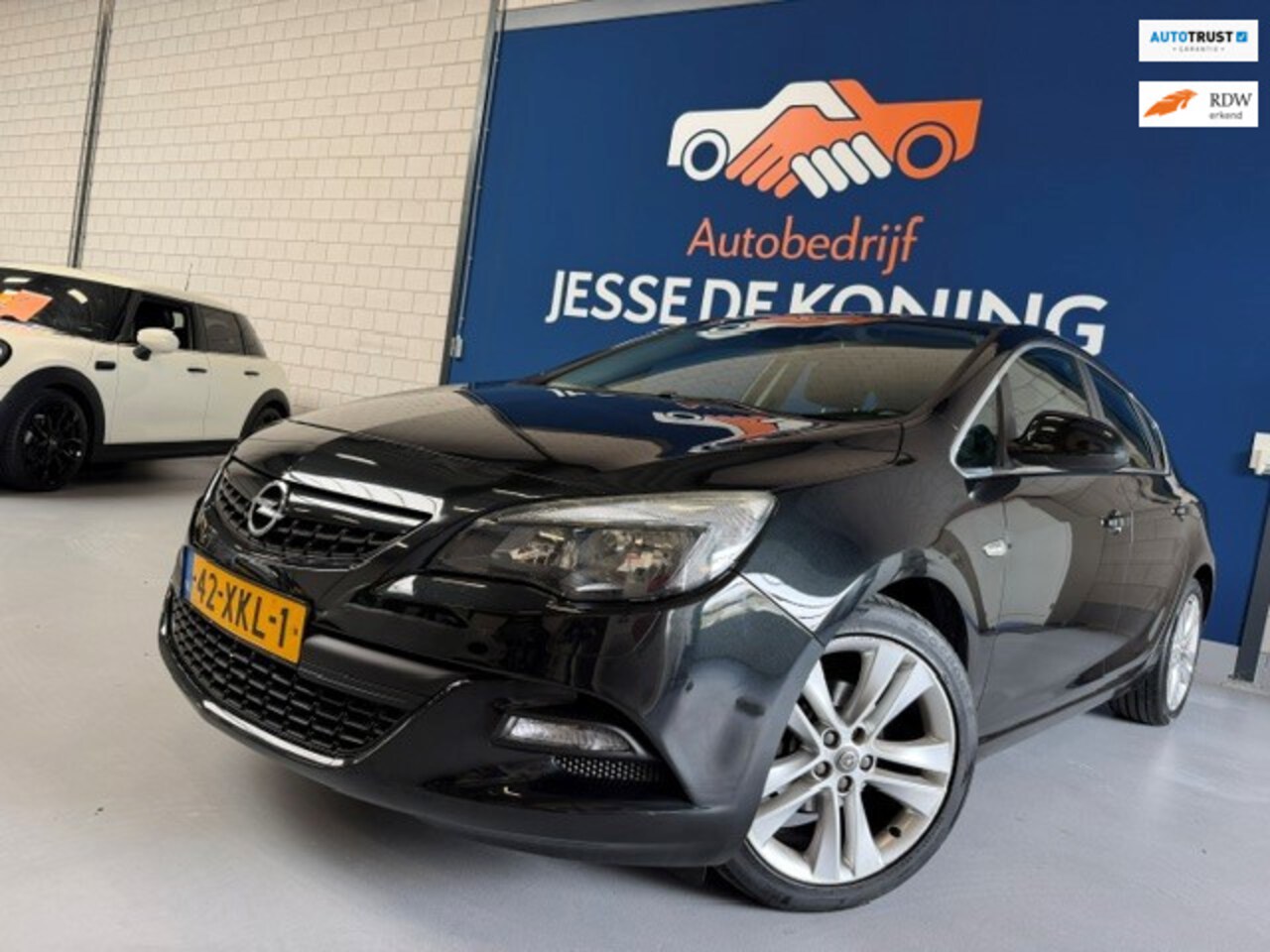 Opel Astra - 1.4 Turbo Sport / bj.2012 / kleur: zwart / 5 deurs / navigatie / climate / cruise /NAP met - AutoWereld.nl