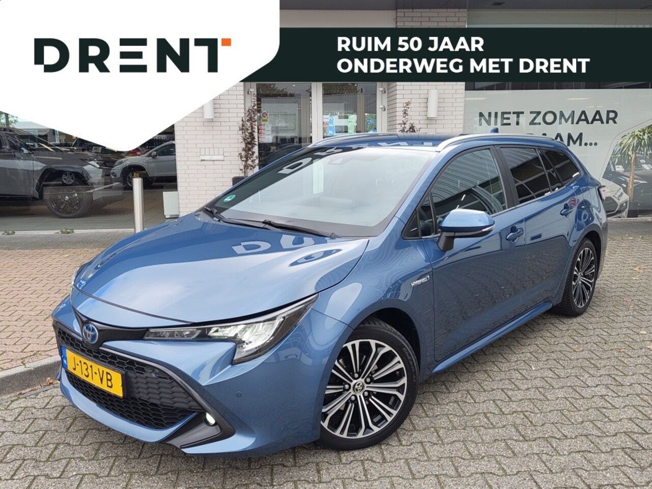 Toyota Corolla Touring Sports - 1.8 Hybrid Business Plus | Trekhaak | Sensoren v/a | Keyless Entry/Start | Stoelverwarming - AutoWereld.nl