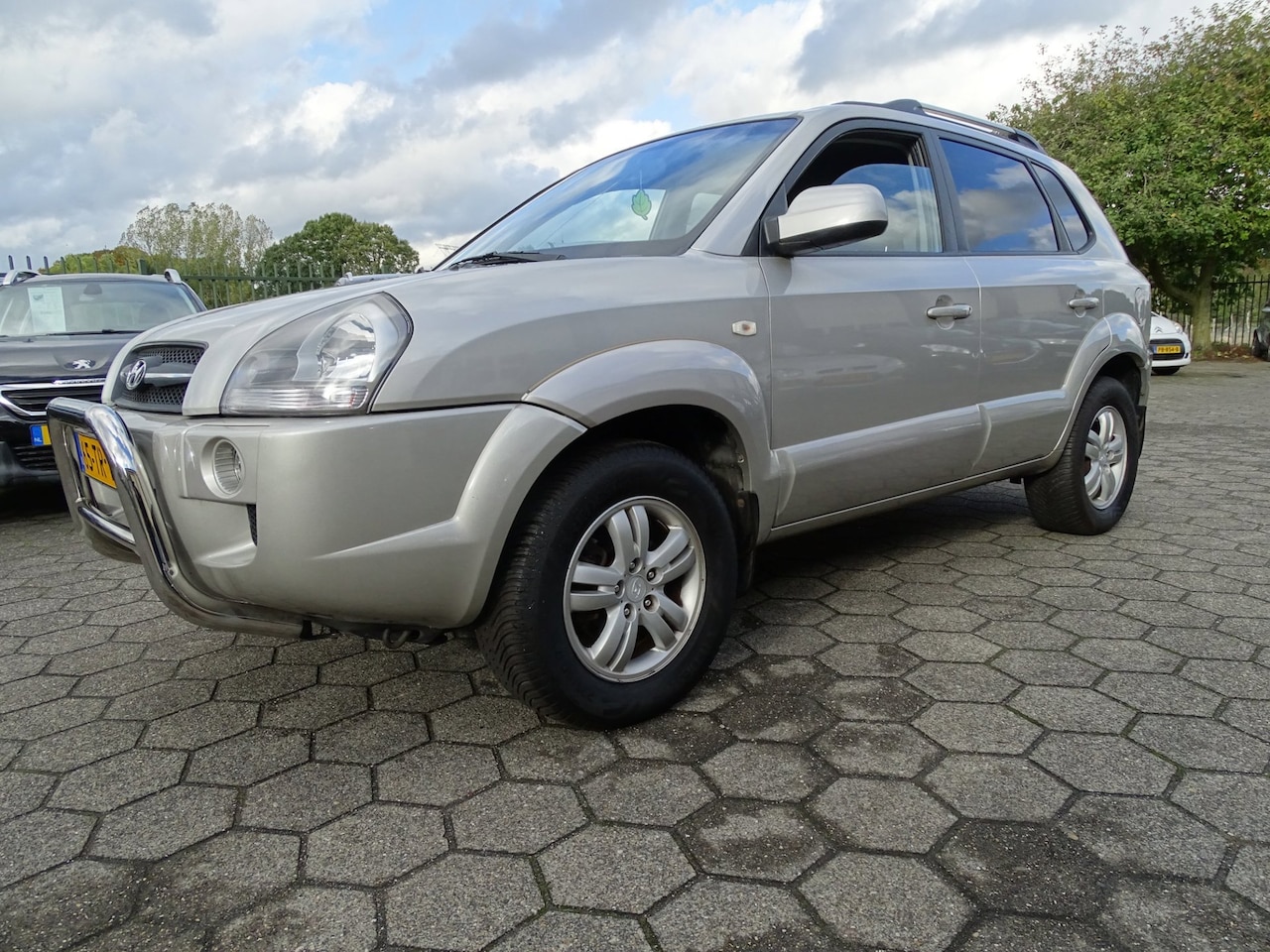 Hyundai Tucson - 2.0i Style AIRCO/LMV/TREKHAAK - AutoWereld.nl