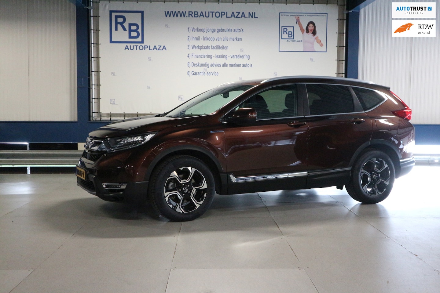 Honda CR-V - 2.0 Hybrid Elegance 12 MAANDEN GARANTIE/ CARPLAY/ LAGE KM'S - AutoWereld.nl