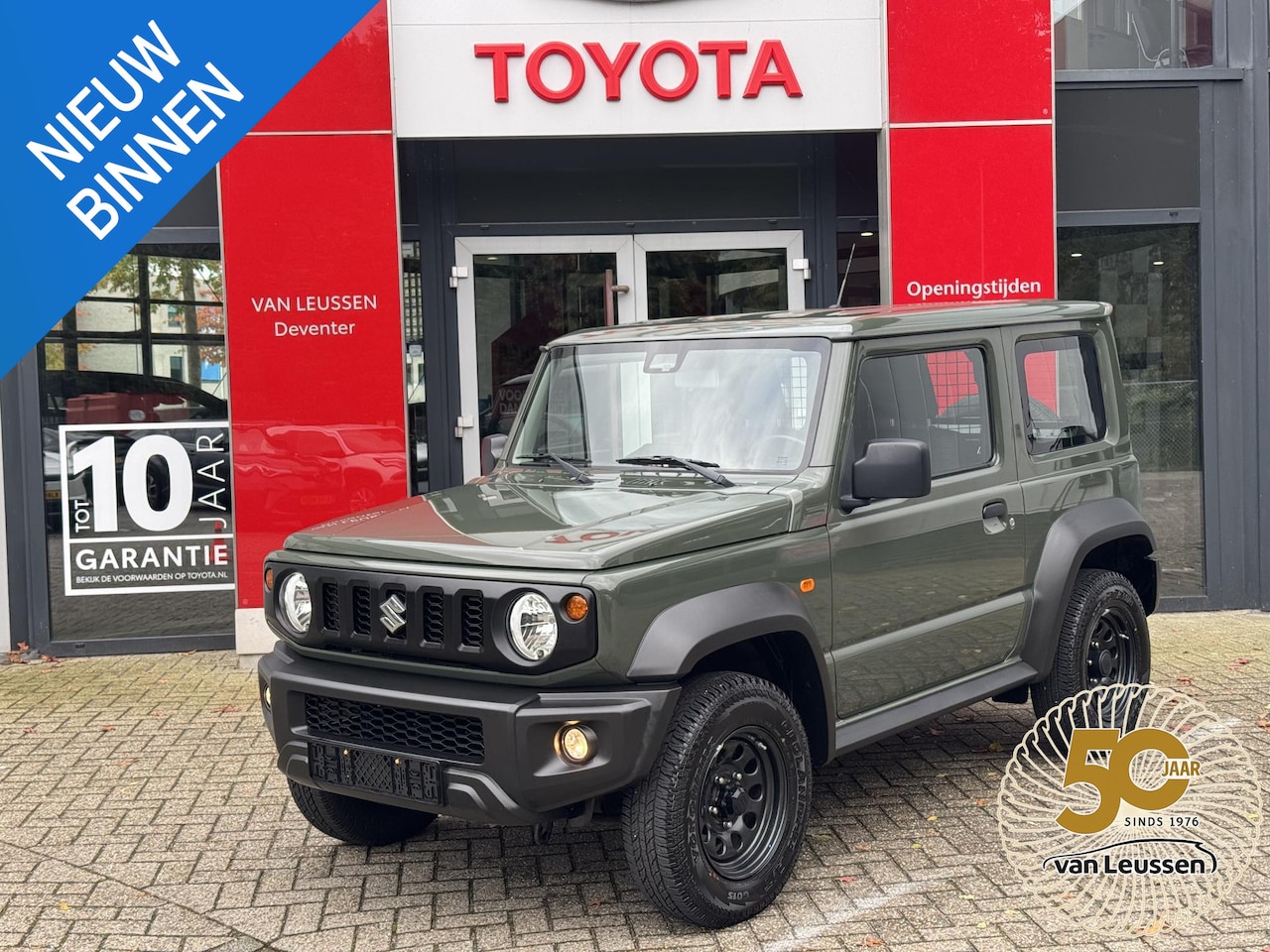 Suzuki Jimny - 1.5 Professional AWD ALL GRIP TREKHAAK AIRCO CRUISE STOELVERWARMING - AutoWereld.nl