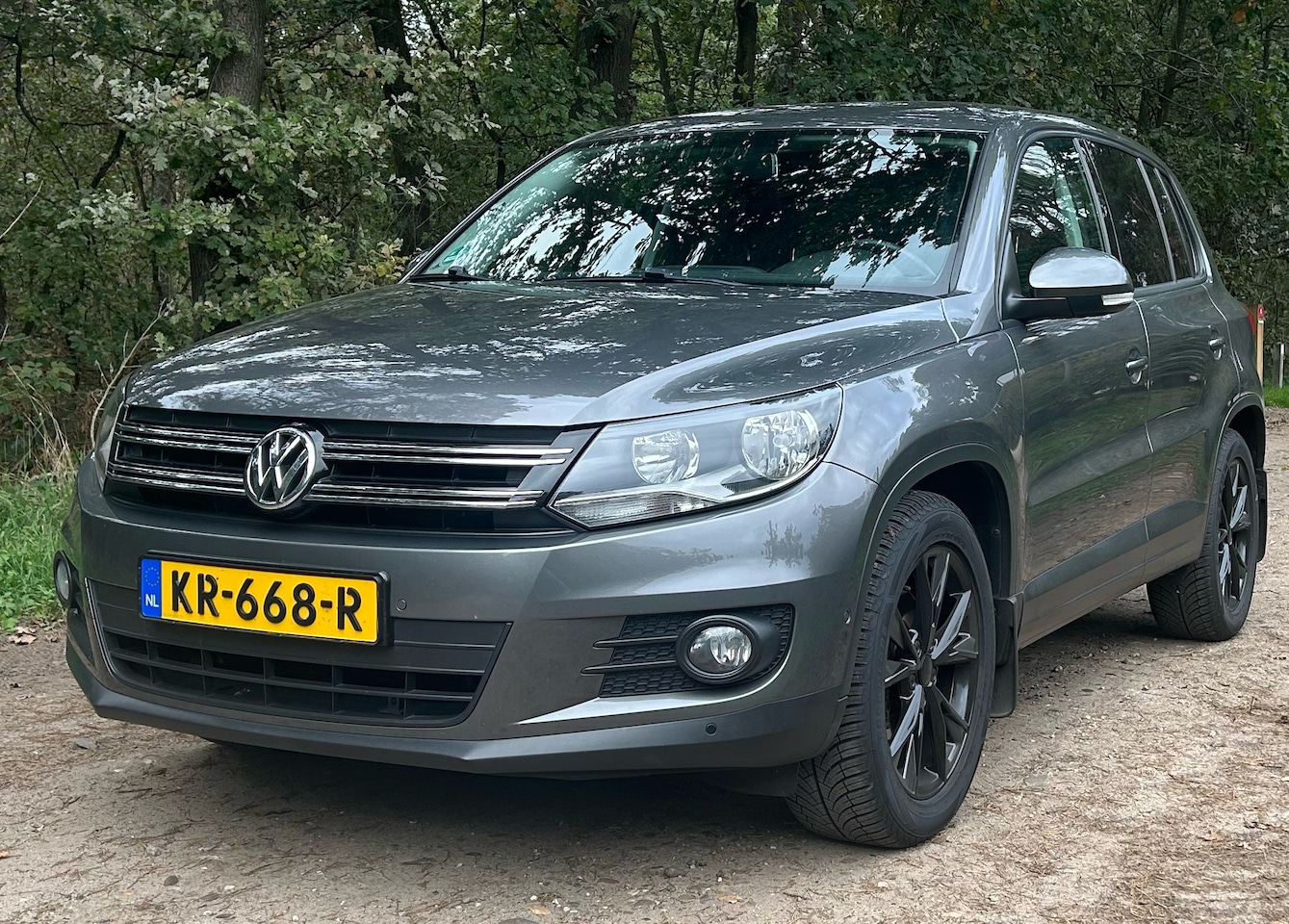 Volkswagen Tiguan - 1.4 TSI Sport&Style - AutoWereld.nl