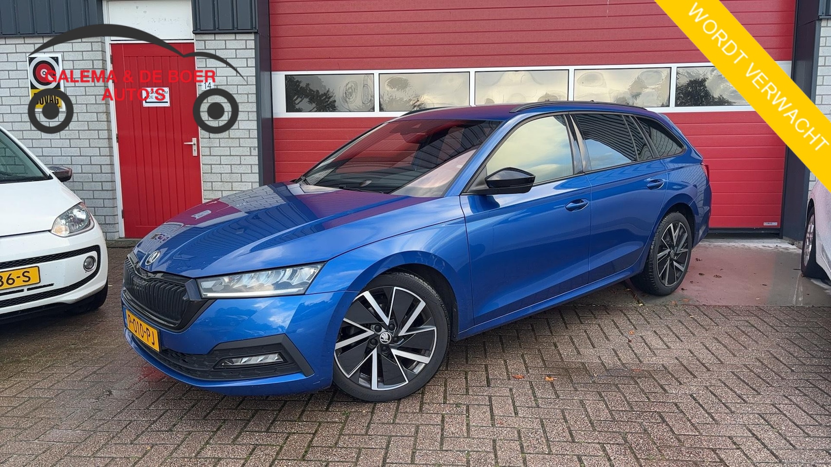Skoda Octavia Combi - 1.5 e-TSI Sport Business AUTOMAAT / TREKHAAK / STOELVERW / STUURVERW / SFEER / CARPLAY / F - AutoWereld.nl