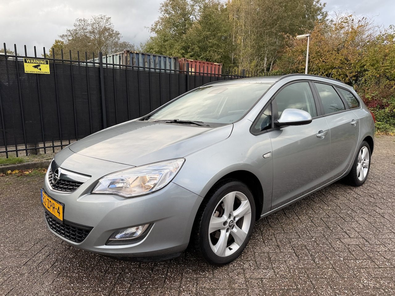 Opel Astra Sports Tourer - 1.4 Edition Airco/Cruise/LMV/Trekhaak - AutoWereld.nl