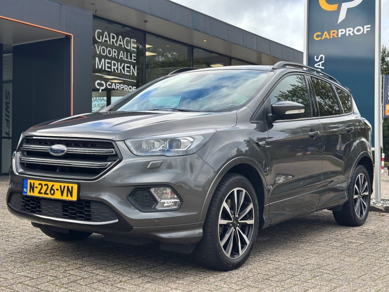 Ford Kuga - 1.5 EcoBoost 4-WD ST-Line '' Trekhaak - Allseasonbanden - Infotainmentsystem '' - AutoWereld.nl