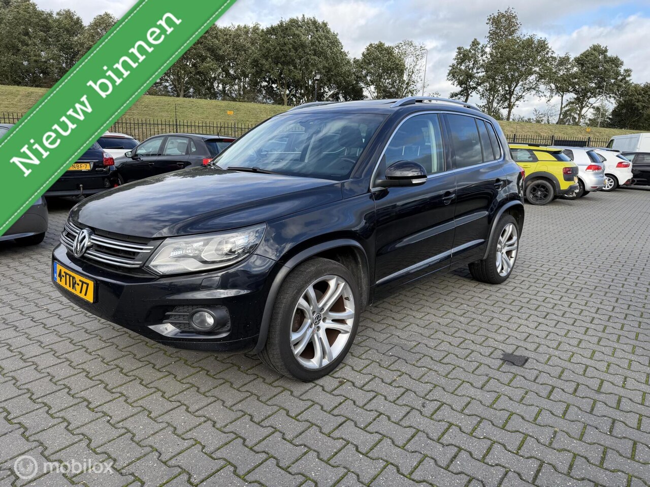 Volkswagen Tiguan - 2.0 TSI Sport&Style 4Motion automaat pano - AutoWereld.nl