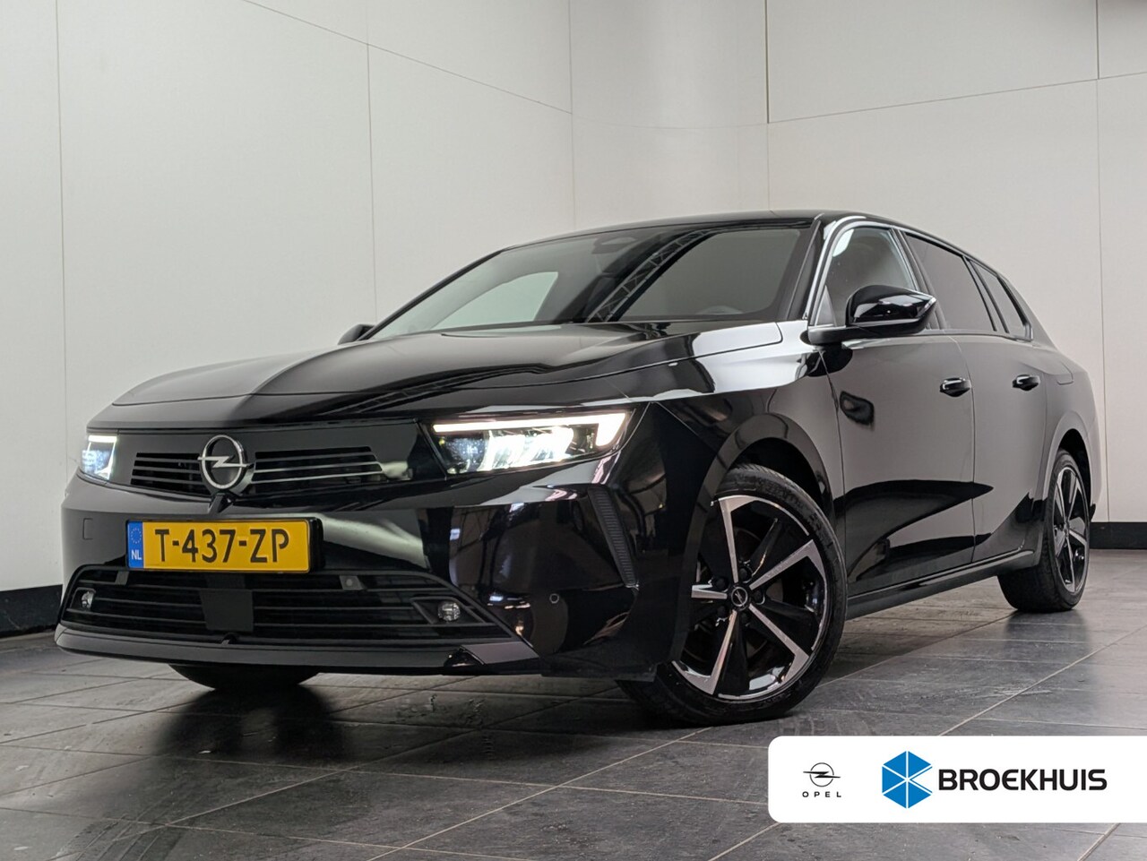 Opel Astra Sports Tourer - 1.6 Turbo Hybrid | Dealer Onderhouden! | Navi | Clima | LED | Cruise Adaptive | Parkeersen - AutoWereld.nl
