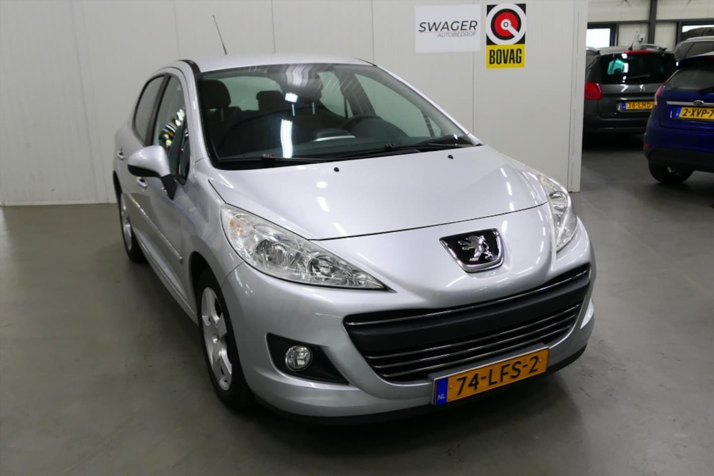 Peugeot 207 - 1.6 VTI 16V 5DRS Première Grip C - AutoWereld.nl