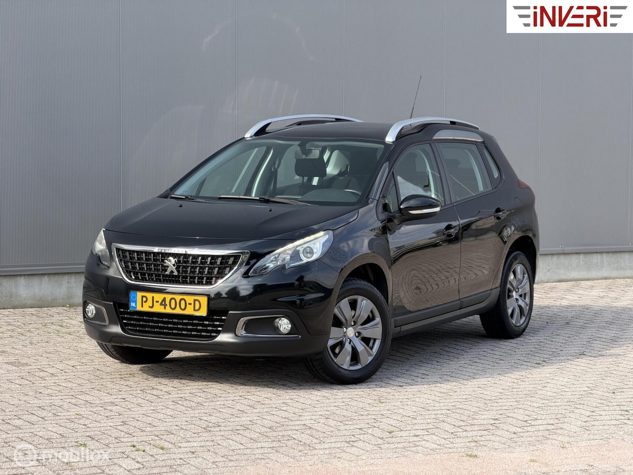 Peugeot 2008 - 1.2 PureTech Allure | Pano | Cruise | Dealer OH - AutoWereld.nl