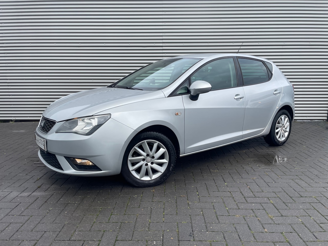SEAT Ibiza - 1.2 Style 2013 met navi / climatronic / lmv - AutoWereld.nl