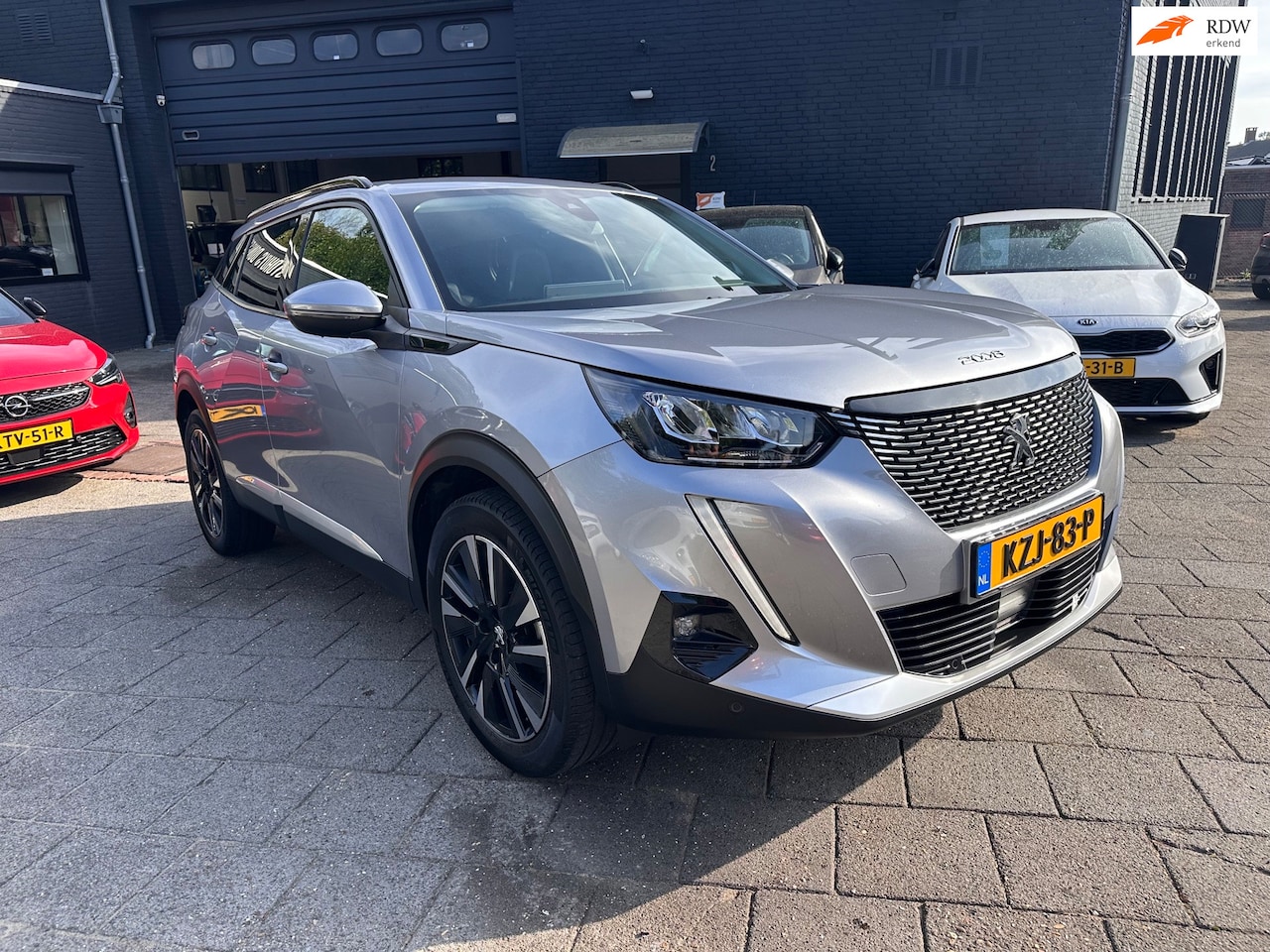 Peugeot 2008 - 1.2 PT (131pk) Allure Pack|Aut|Navi|360 Camera - AutoWereld.nl