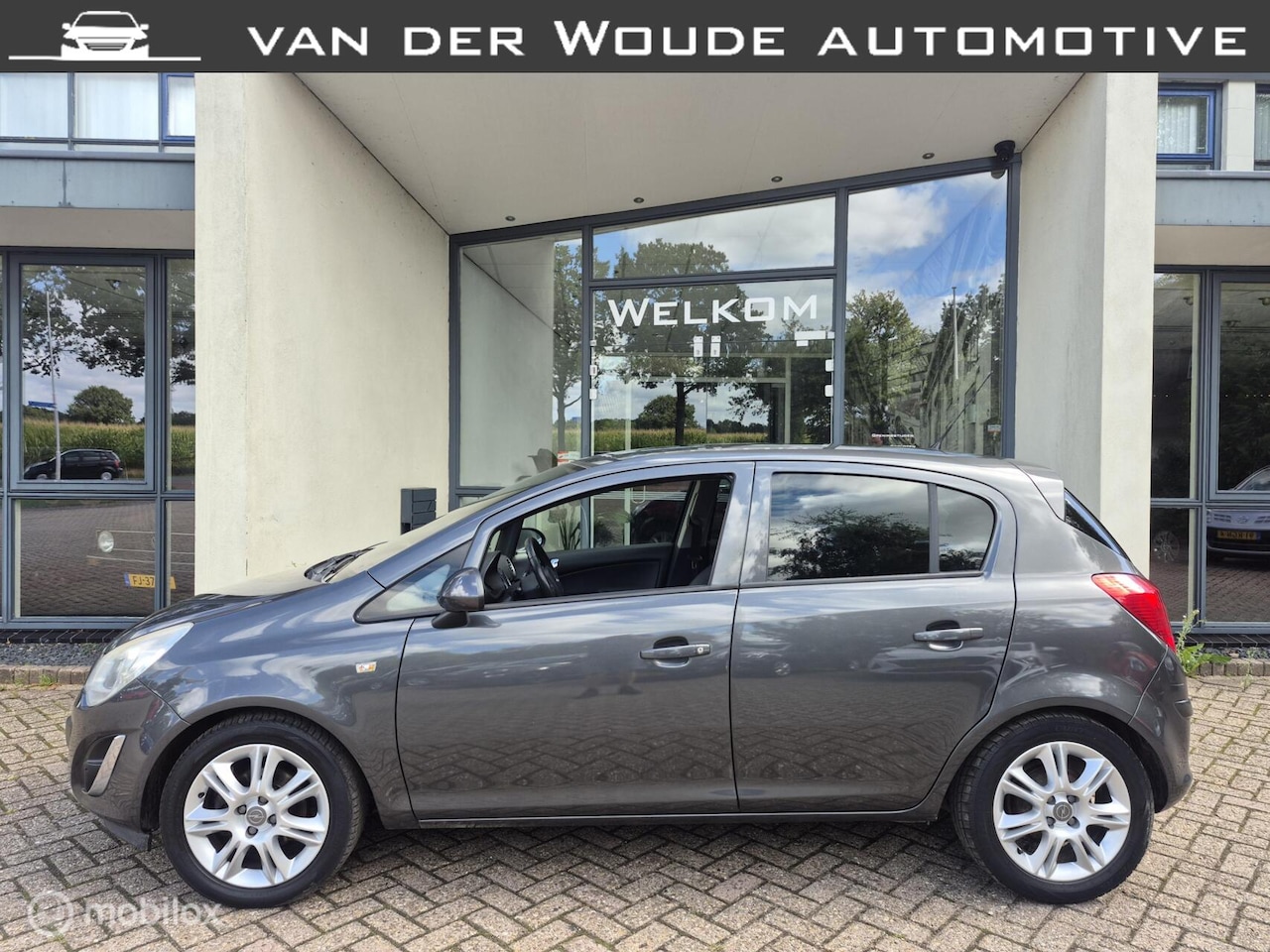 Opel Corsa - 1.2 EcoFlex Cosmo 2011|5DRS,|Clima|Cruise|T.Haak - AutoWereld.nl