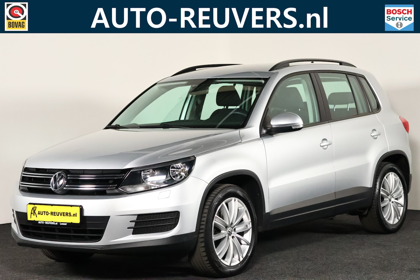 Volkswagen Tiguan - 1.4 TSI Trendline / Navi / Cruisecontrol / Trekhaak - AutoWereld.nl