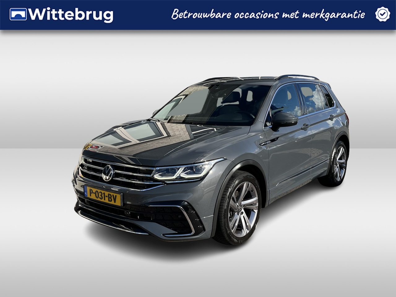 Volkswagen Tiguan - 1.5 TSI R-Line / AUTOMAAT/ 2X R-LINE/ NAVI/ DIGITAL DASH/ CLIMATE/ STOELVERWARMING/ PARK. - AutoWereld.nl