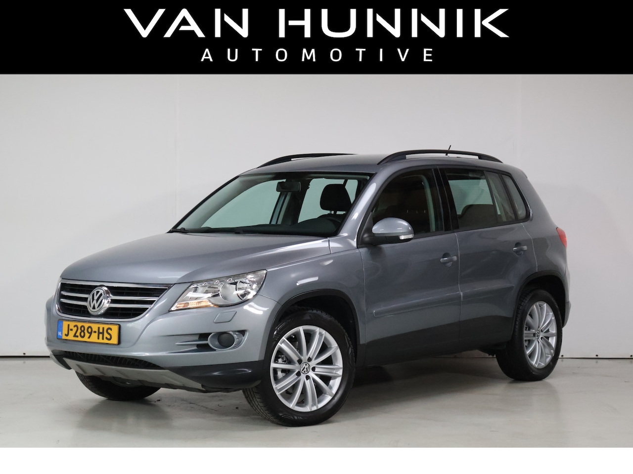 Volkswagen Tiguan - 1.4 TSI Sport&Style 4Motion | Trekhaak | Cruise | Navi | Stoelverwarming - AutoWereld.nl