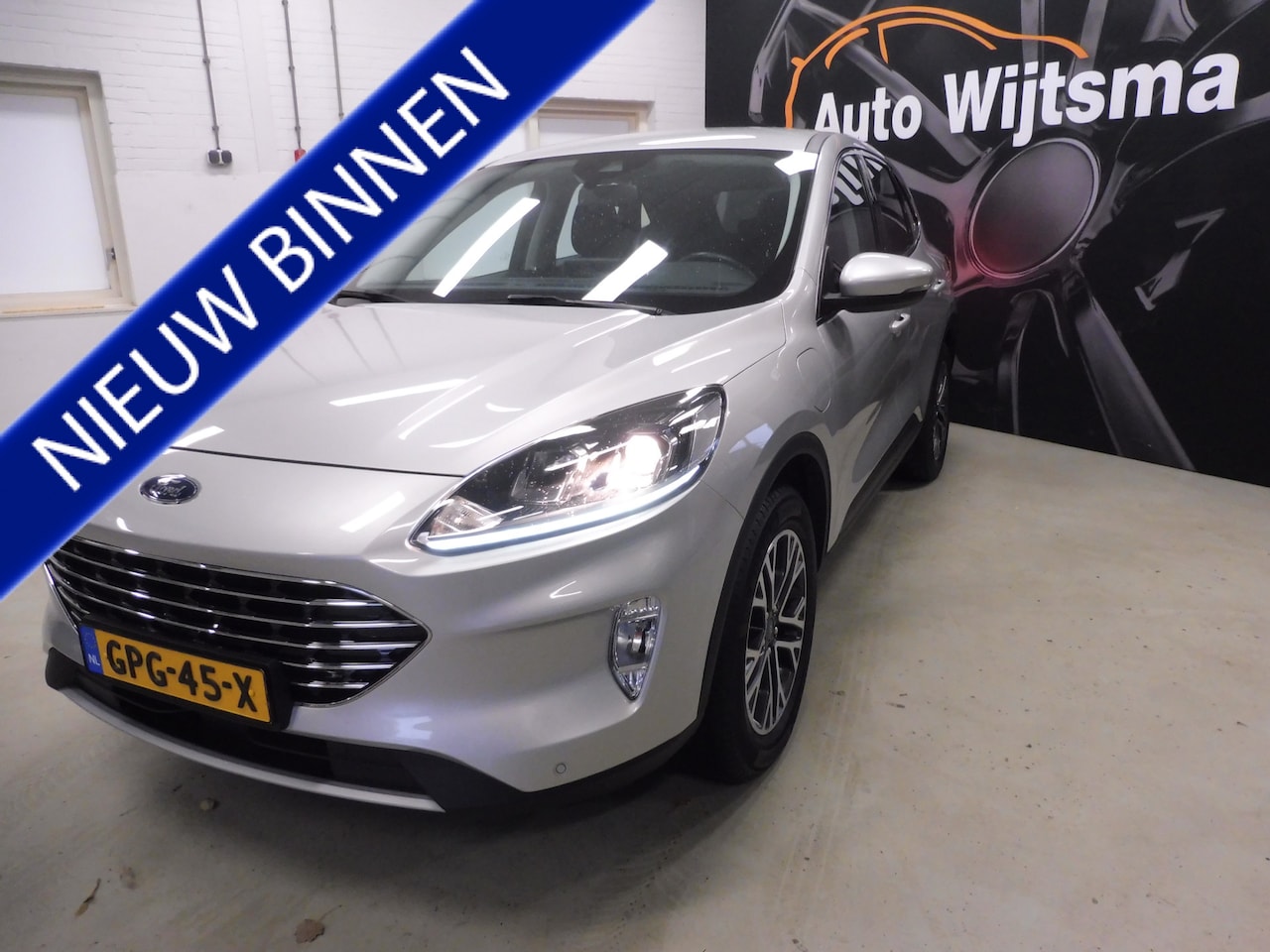 Ford Kuga - 2.5 PHEV Titanium X Winterpack | Trekhaak | Cruise | LMV | Sfeerverl. | Nieuwst. - AutoWereld.nl