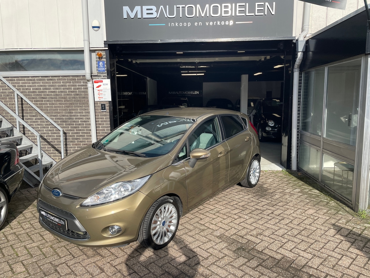 Ford Fiesta - 1.25 Titanium-5 Deurs/airco/sport Velgen/exclusive!/Stoelverwarming! - AutoWereld.nl