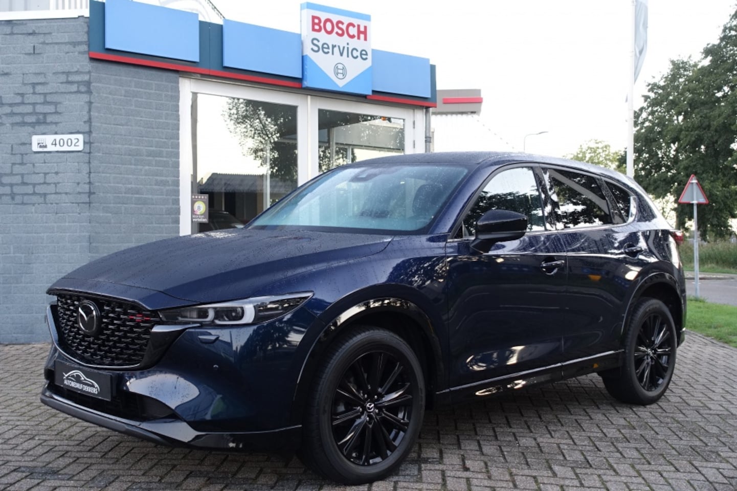 Mazda CX-5 - 2.5 SKYACTIV-G 194pk 2WD Aut Homura 2.5 SKYACTIV-G 194PK 2WD AUT HOMURA | BOSE | HEAD UP | - AutoWereld.nl