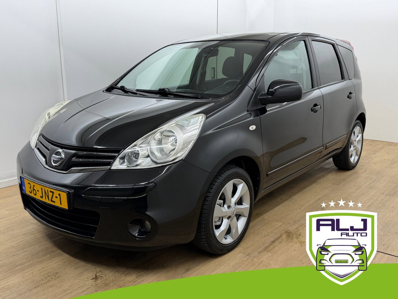 Nissan Note - Occasion 1.4 Acenta | Zwart | Tweedehands Nissan Note | Airco | Cruise | Bluetooth audio | - AutoWereld.nl
