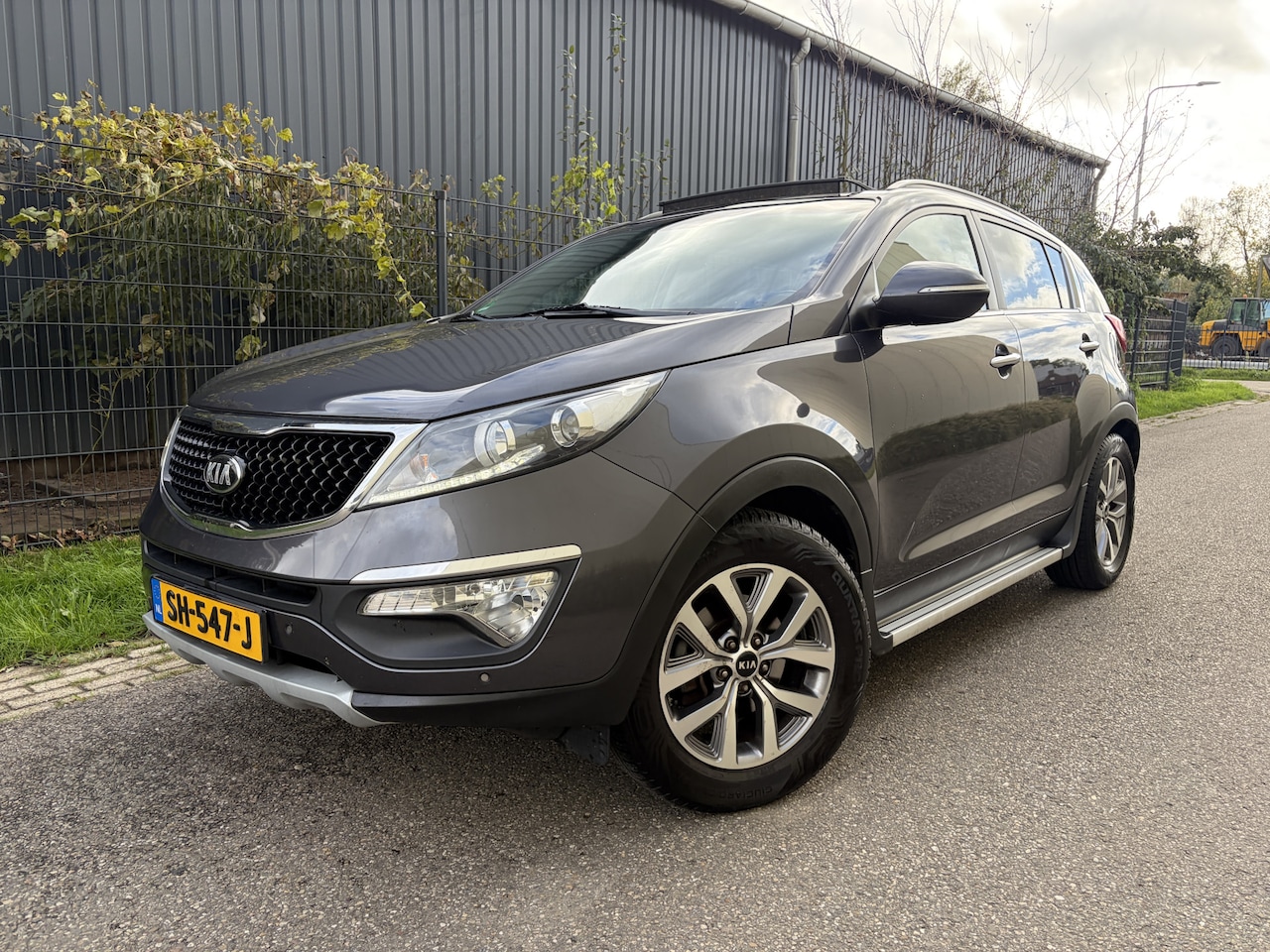 Kia Sportage - 1.6 GDI DynamicLine / NAVI / PANORAMADAK / CRUISE / LEER / STOELVERWARMING - AutoWereld.nl