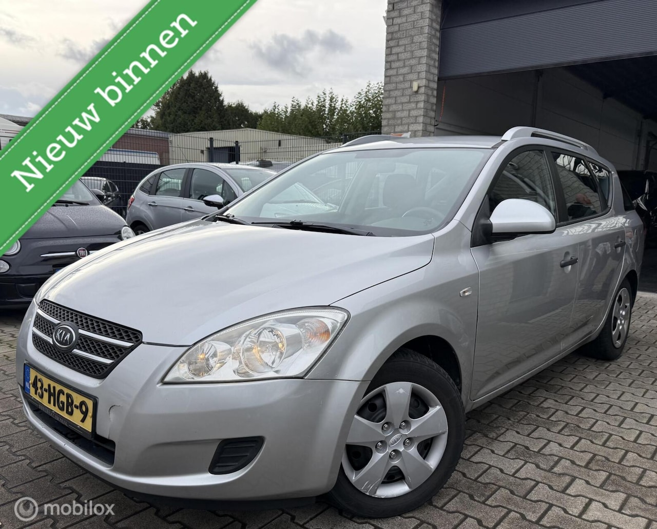 Kia Cee'd Sporty Wagon - 1.4 X-tra / Navi / NL Auto / N.A.P - AutoWereld.nl
