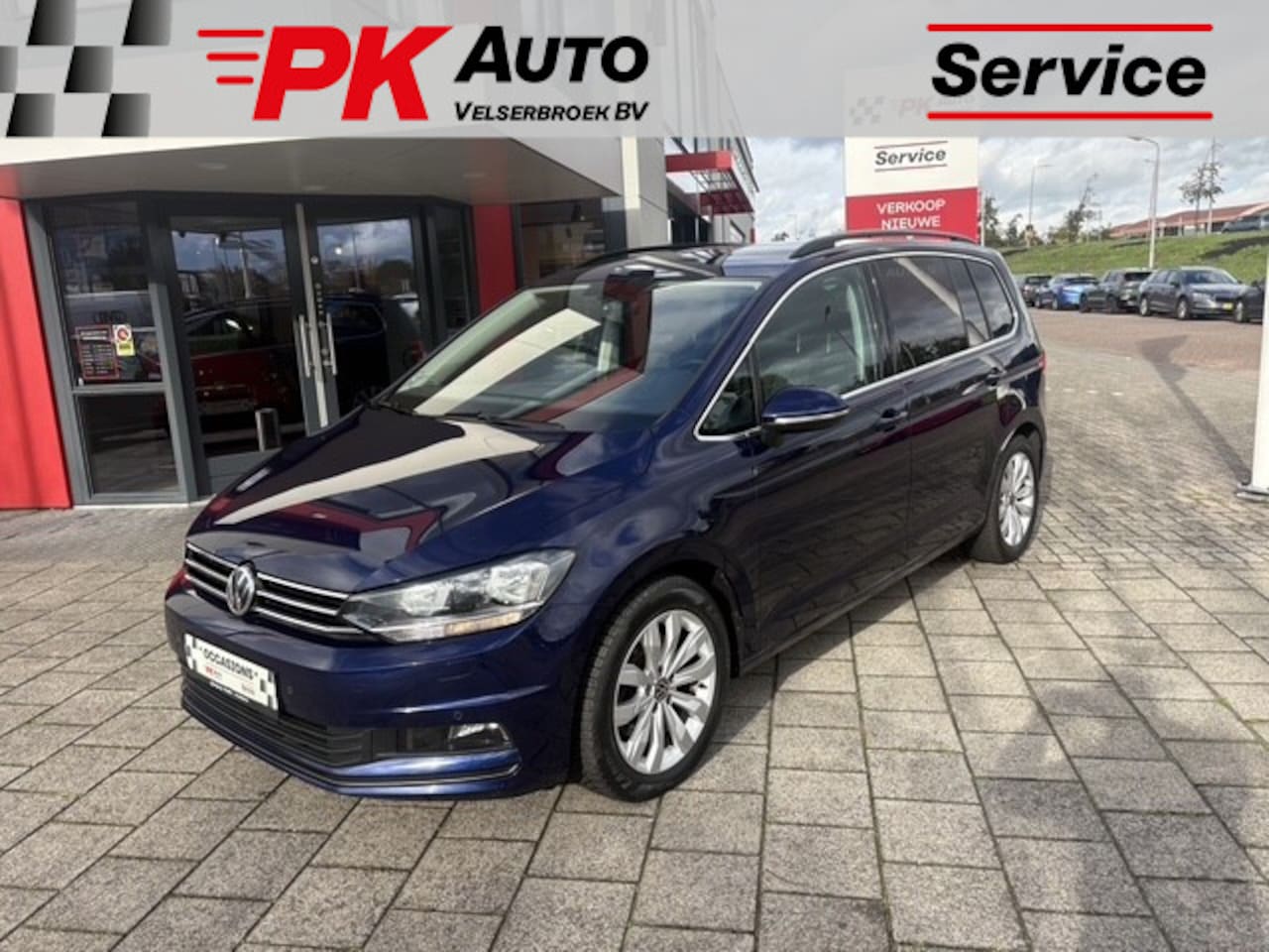 Volkswagen Touran - 1.5 TSI Comfortline Business 7p | Navi | Trekhaak | Cruise | 101.526 km Dealeronderhouden - AutoWereld.nl