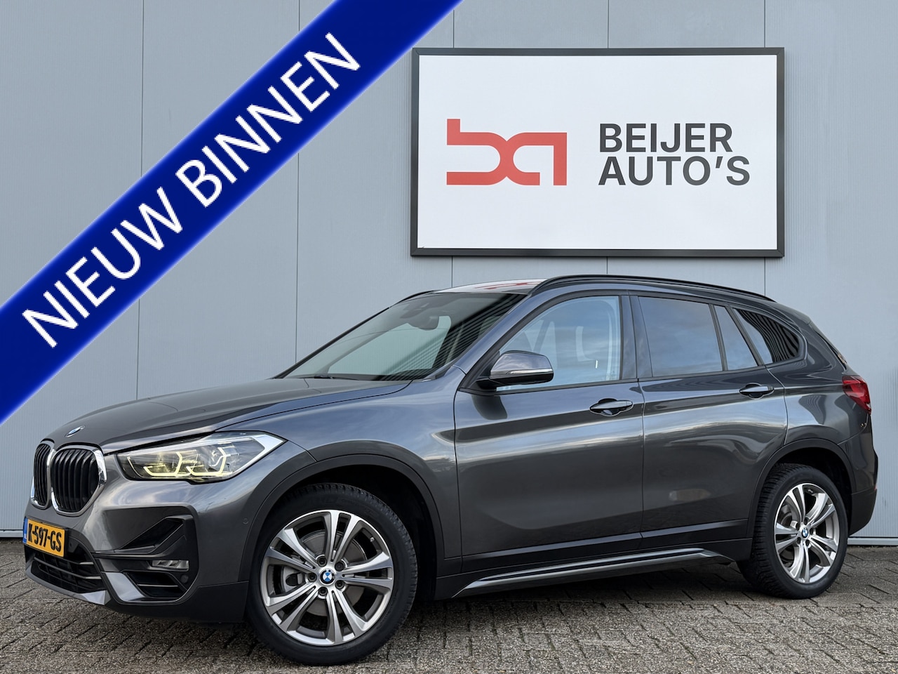 BMW X1 - sDrive18i High Executive Automaat Navigatie/Trekhaak. - AutoWereld.nl