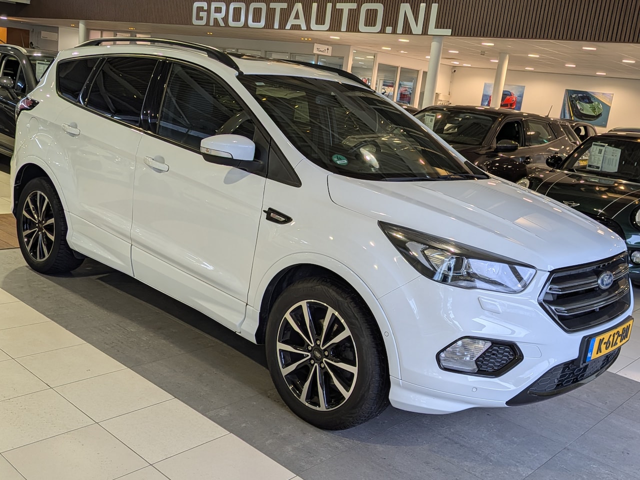 Ford Kuga - 1.5 EcoBoost ST Line Panoramadak, Airco, Cruise Control, Trekhaak, Stuurbekrachtiging - AutoWereld.nl