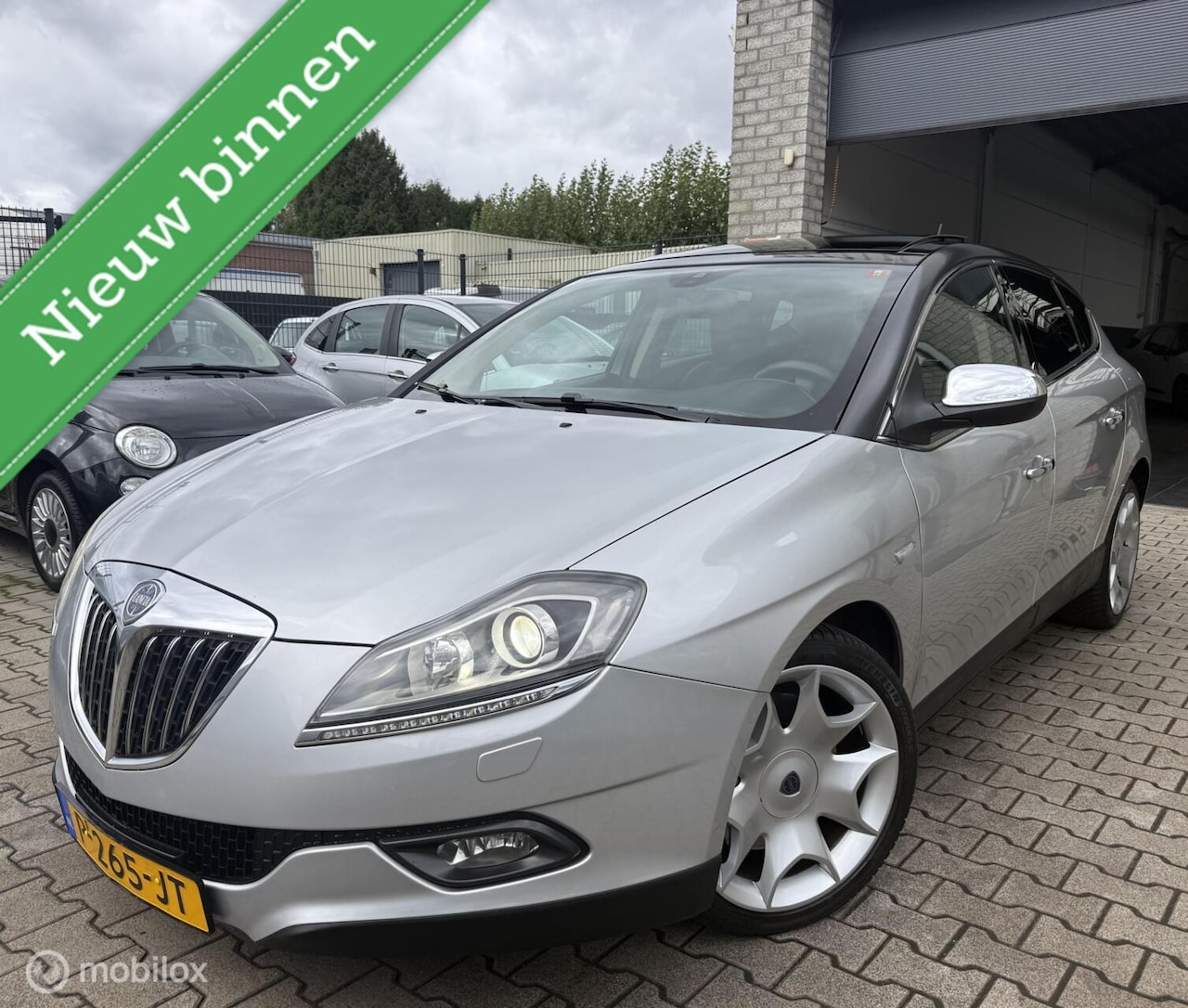 Lancia Delta - 1.8-16V Di Platino / NAVI / LEER / PANO / AUT - AutoWereld.nl