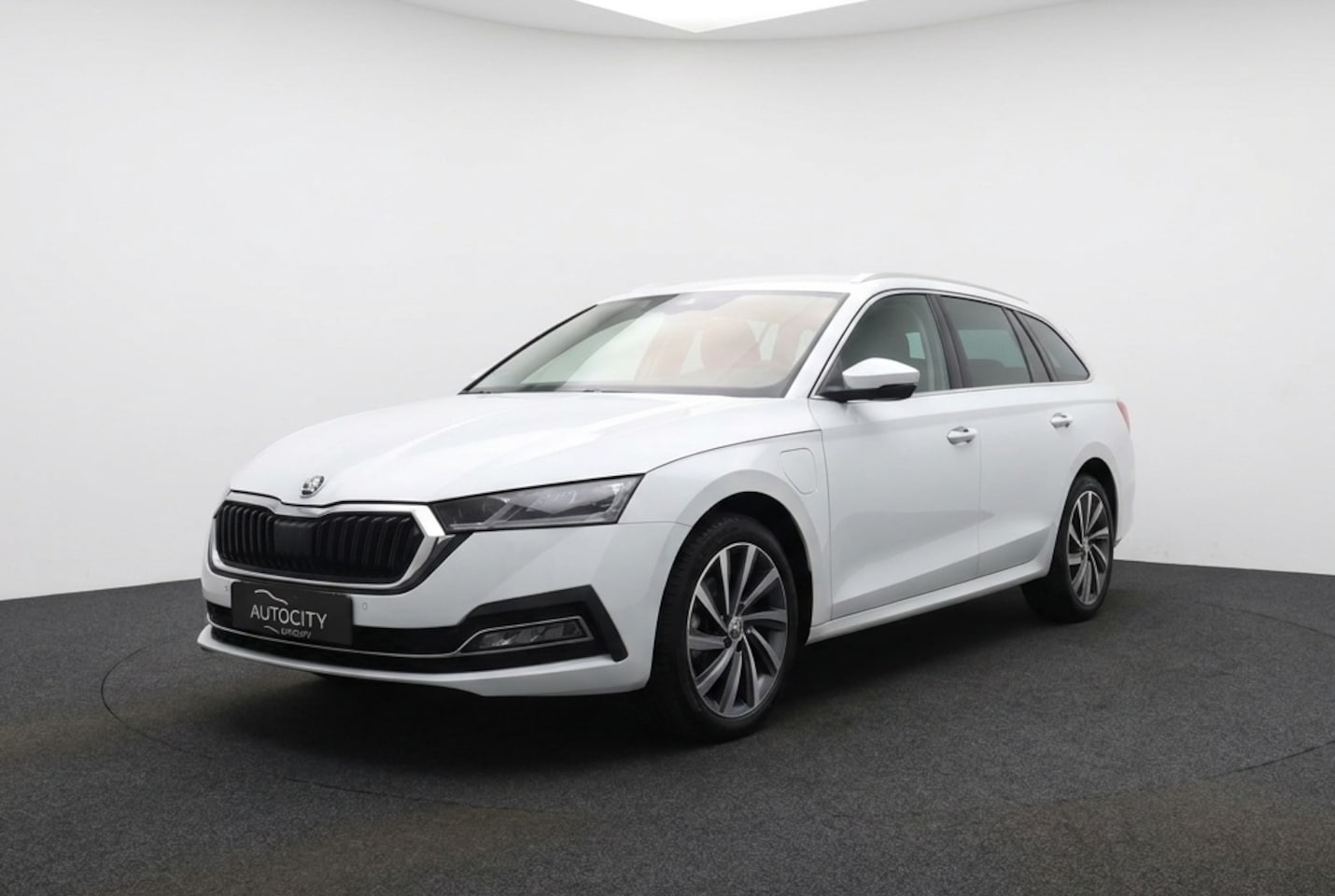 Skoda Octavia Combi - 1.4 TSI iV PHEV Style 204PK | Canton Sound | Head up | Winterpakket | Memory - AutoWereld.nl